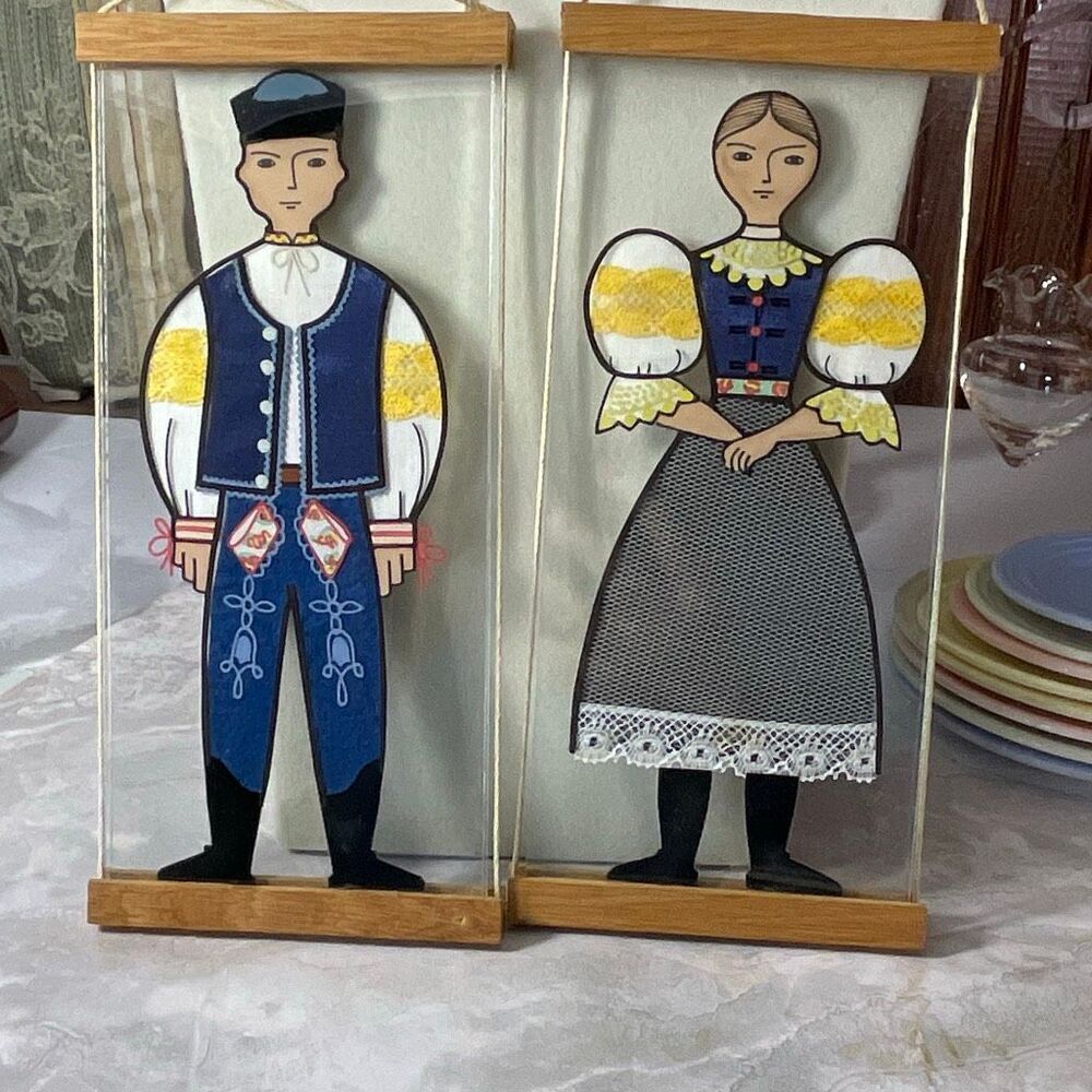 One pair of Czechoslovakian folk art wall hangings.